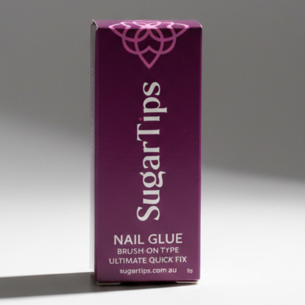 Brush-On Nail Glue — Strong Hold, No Damage.