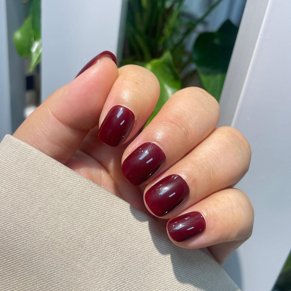 Sugar Tips Wine Not Short Glossy Burgundy Red press-on nails front view.