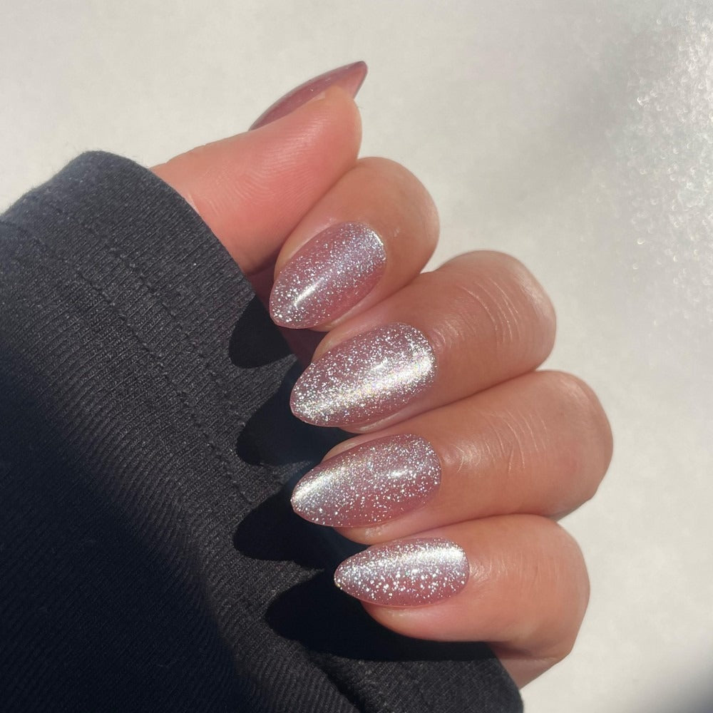 Sugar Tips Velvet Stardust Sparkly Pink & Silver Almond press-on nails front view.
